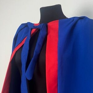 Blue cape with Red trim